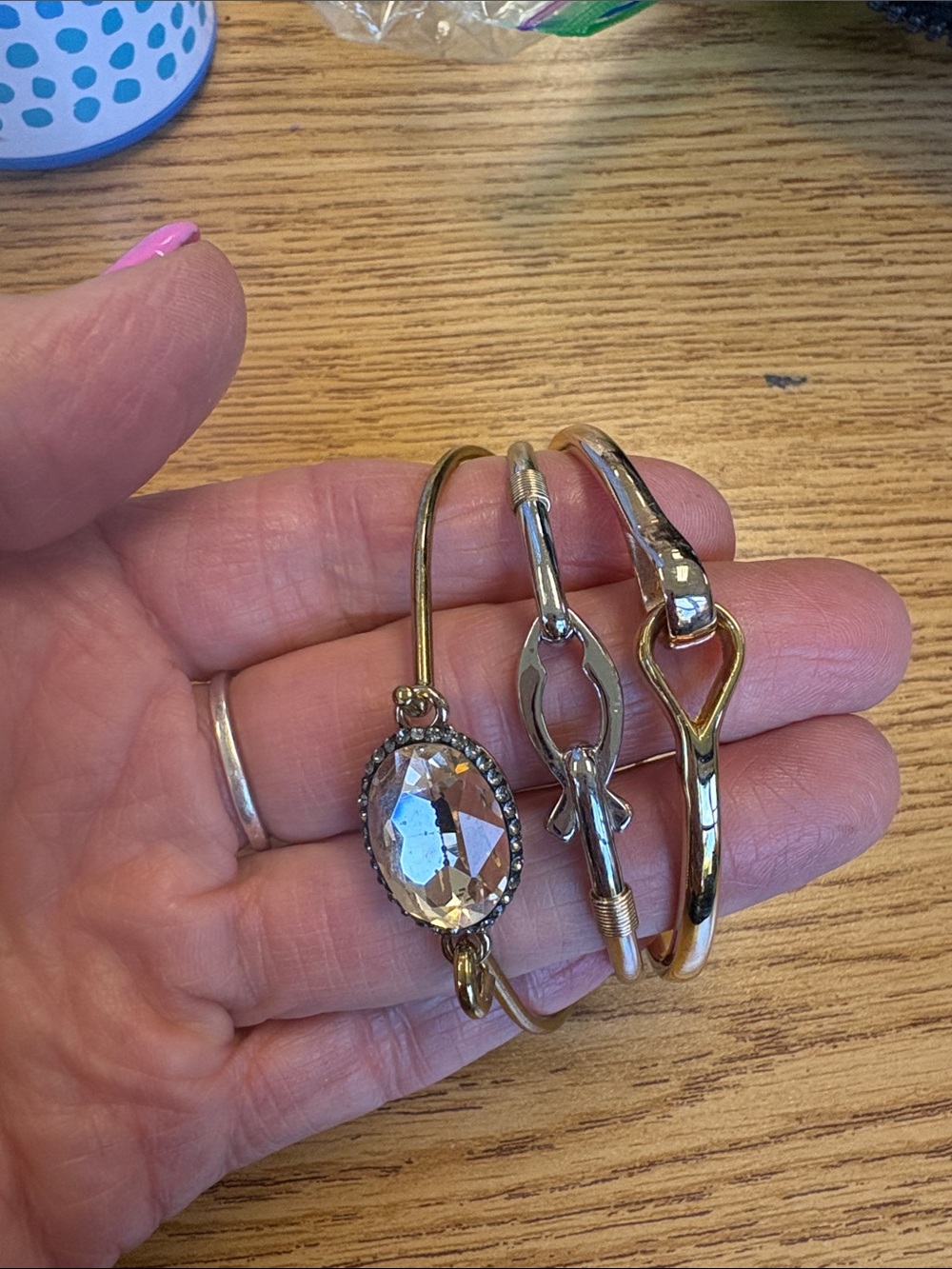 1 Gold-Tone Crystal Accent Bangle Bracelet -1 gold tone and 1 silver tone -3 !